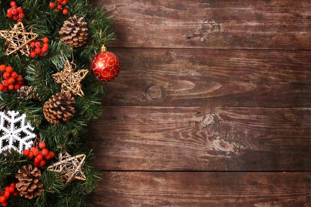 istock Christmas ornaments on wooden table. 1435896875