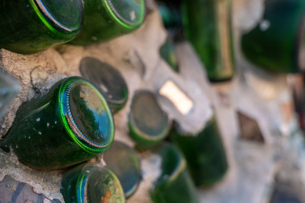 istock Beer bottles embedded in a wall for art 1435904208