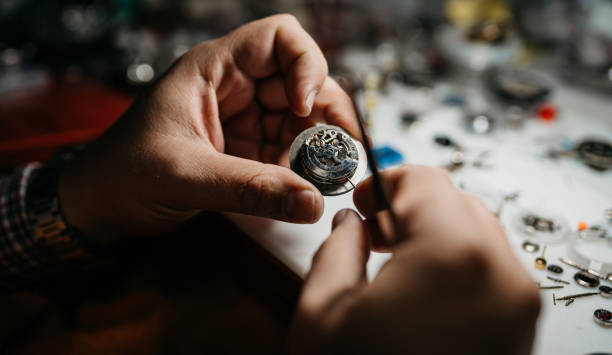 laboratorio orologiaio - watch maker work tool repairing watch foto e immagini stock