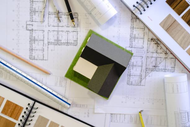 istock Architect Design Concept, House model on Buleprint construction drawing and drawing equipment stationary 1435907183