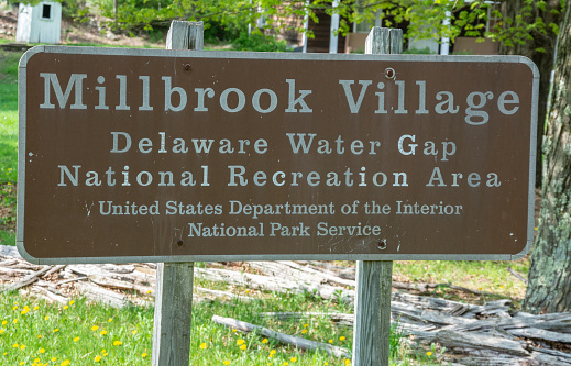 Hardwick, New Jersey, United States of America - May 1, 2017. Sign at the entrance to Millbrook Village in Delaware Water Gap, NJ.