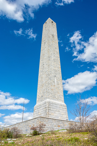 High Point State Park, New Jersey, United States of America - May 2, 2017. High Point Monument in New Jersey, USA. The 220 feet (67 m) structure marks the highest point in the state of New Jersey. Designed by Marion Sims Wyeth, the obelisk monument was built through the generosity of Colonel Anthony R. and Susie Dryden Kuser from Bernardsville, NJ, who also donated the land for High Point State Park, in honor of all New Jersey war veterans. Construction began in 1928 and completed in 1930.