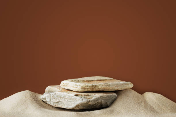 istock Stone podium mock up for product cosmetic with sand 1435915577