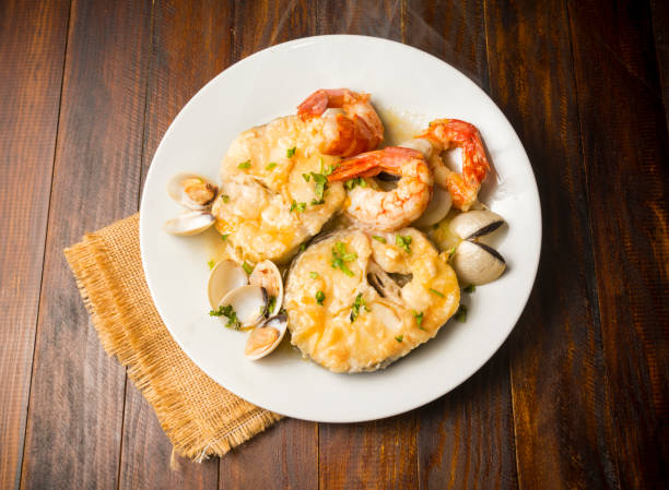 Hake with clams Hake with clam and shrimps hake stock pictures, royalty-free photos & images