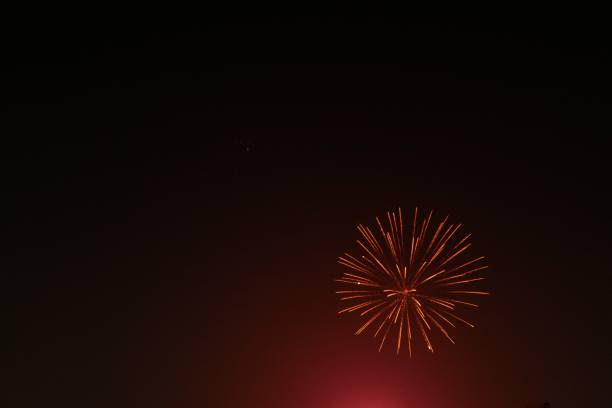 Firecrackers are exploding in the sky. stock photo