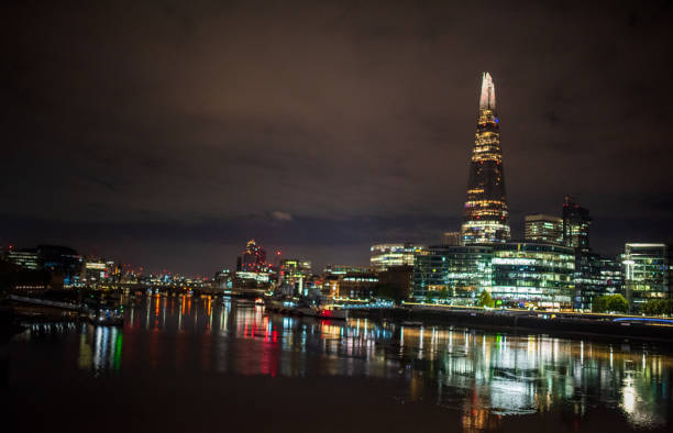 istock colorful night in central london on river thames 1435924864