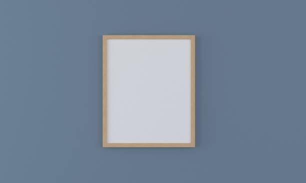 istock 3D rendering of a mockup frame near a blue wall 1435924949