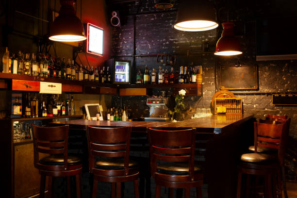 Interior of modern European pub. Dark moody interior of modern European pub. bar area stock pictures, royalty-free photos & images