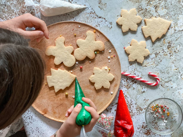 istock Box with Christmas cookies ready to decorate 1435932137