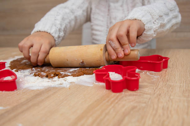 istock Gingerbread dough for Christmas cookies and cookie cutters 1435933432