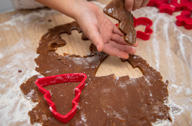 istock Making a Christmas cookies from Gingerbread dough and cookie cutters. 1435933465