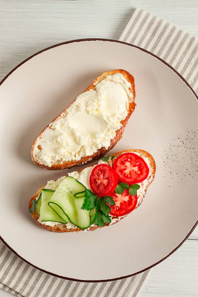 istock Sandwich, with cream cheese, homemade, on a cutting board, rustic style, no people, selective focus, breakfast 1435937599