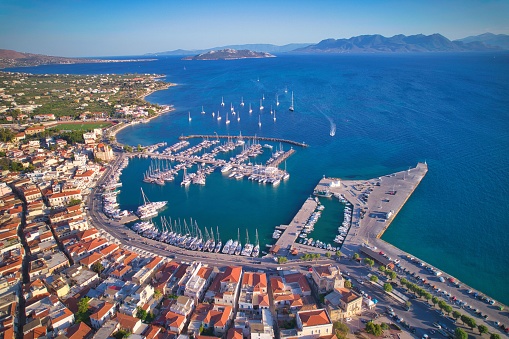 Aegina, Greece – June 02, 2022: A beautiful aerial view of Aegina Town and harbor under the clear sky