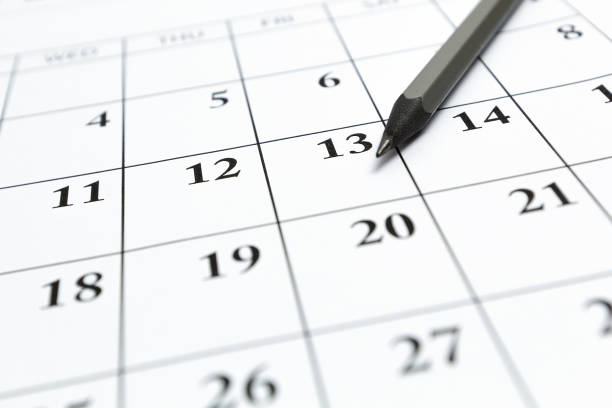 istock Page with calendar dates and pencil for marking. Planning concept. 1435942287