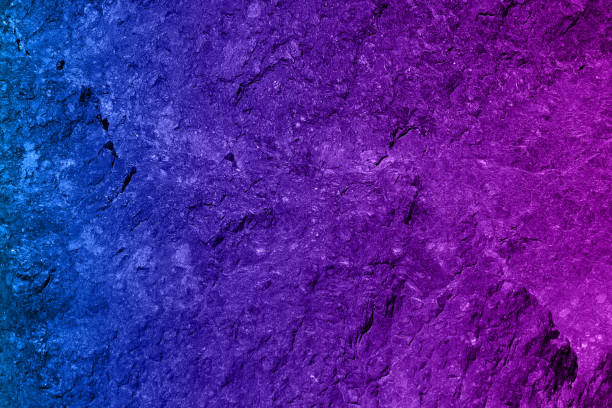 istock Blue and pink light colored rock texture background. Copy space for text 1435943322