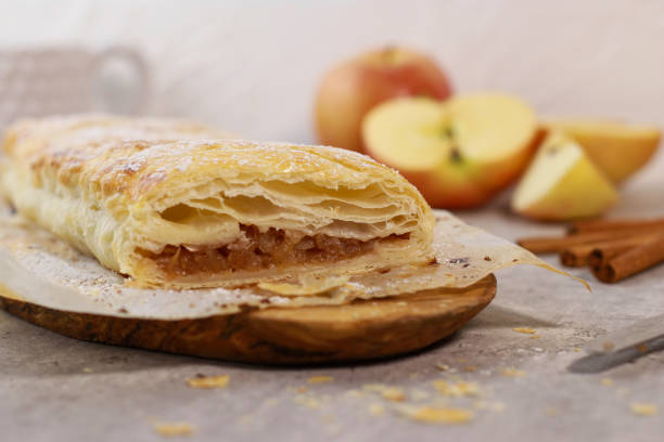 istock apple pastry strudel roll with cinnamon on grey marble table 1435944952