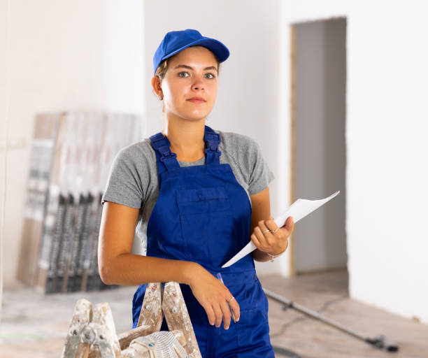 istock Young woman worker makes important notes on paper 1435949022