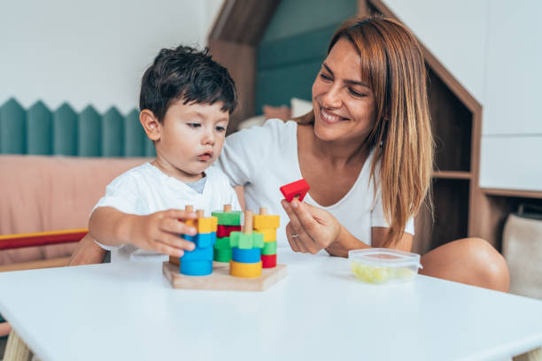 istock Mother playing with toddler 1435953961