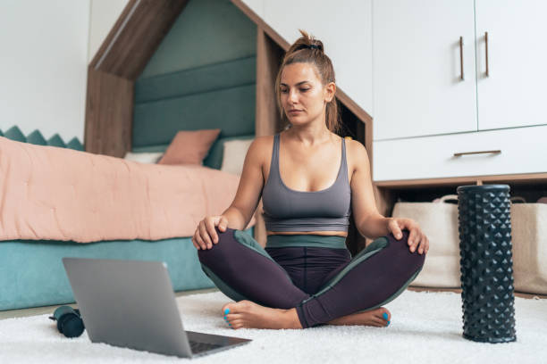 istock Woman working out at home 1435953972