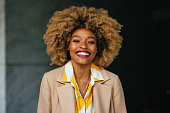 istock Portrait of a Happy African American Woman in a Coat 1435955973
