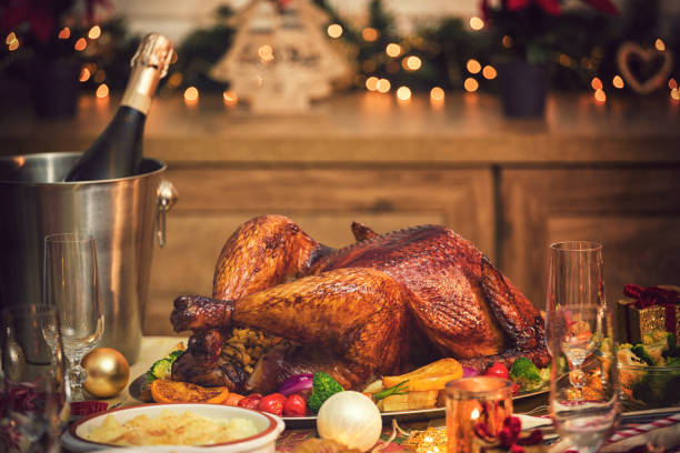 Traditional Stuffed Christmas Turkey with Side Dishes stock photo