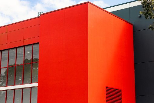 Closeup industrial building, background with copy space, full frame horizontal composition