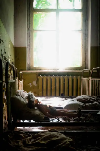 Photo of A doll in an abandoned nursery in abandoned Chernobyl region, site of the world's worst nuclear disaster