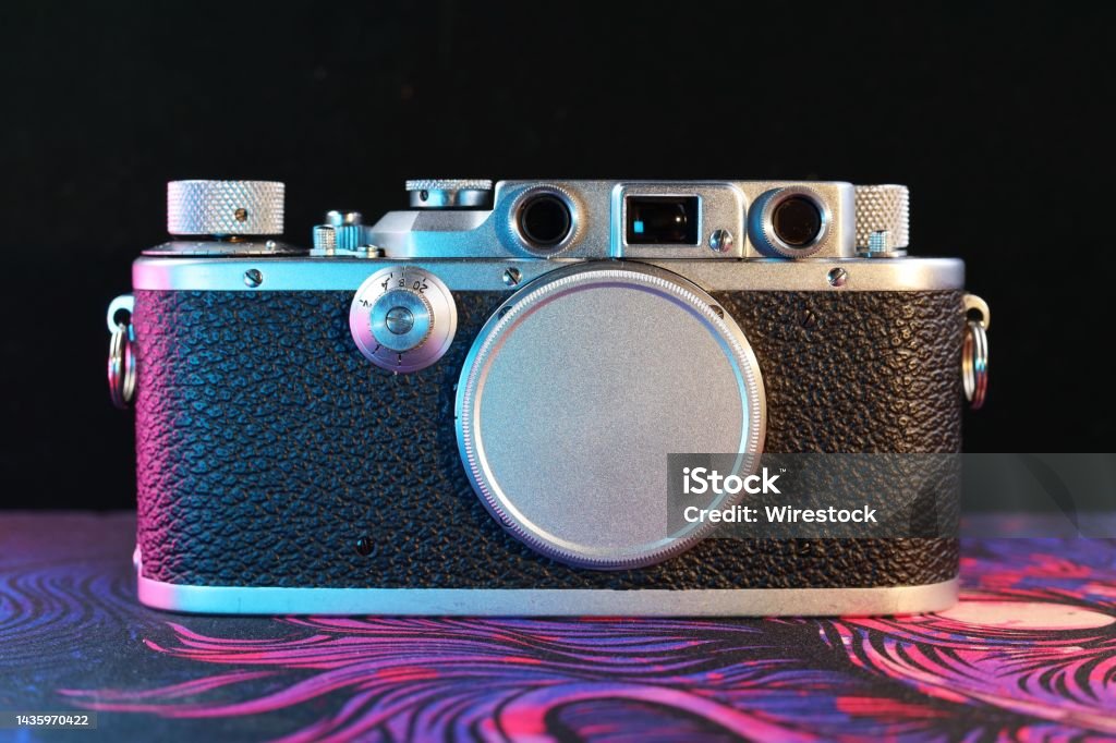 Closeup shot of the classic Leica camera A closeup shot of the classic Leica camera Black Color Stock Photo