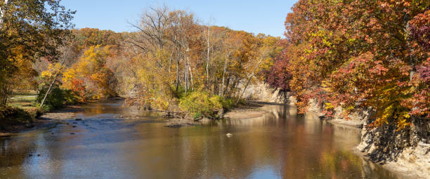 istock Shale cliff along river in autumn 1435975639