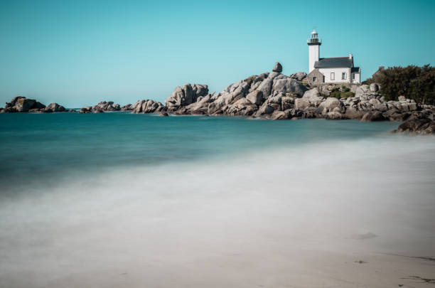 istock Pontusval lighthouse from coast in Kerlouan 1435976417