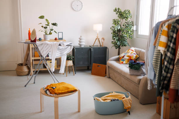 Small cozy apartment with ironing board