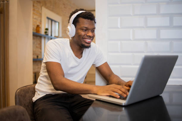 istock Young fashionable man working at home 1435992078