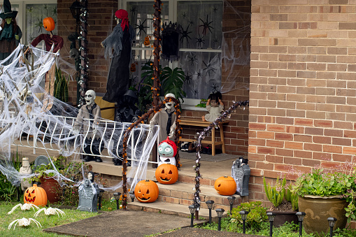 Halloween house home outside decoration. Front porch haloween party trick or treat spooky decor