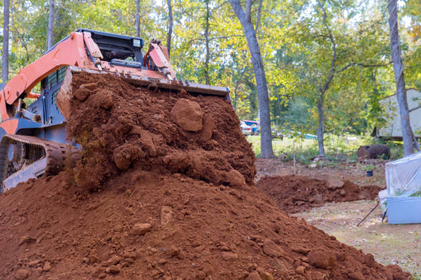istock An small tractor used for moving soil for a landscaping project on a construction site 1436000262