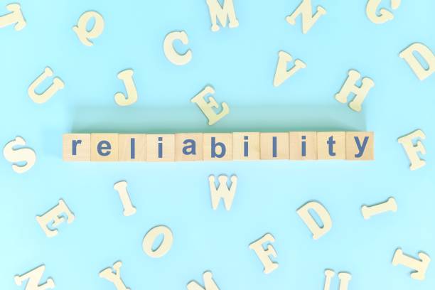 istock Reliability core values concept in business, company and organization. Word typography on wooden blocks flat lay. 1436000313