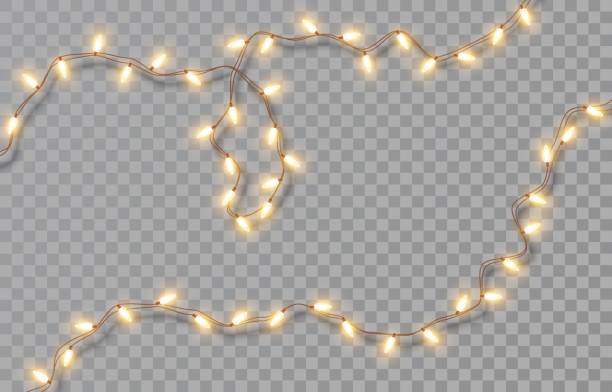 christmas lights isolated on a transparent background. christmas electric garland of yellow light bulbs. glowing lights for christmas greeting card design, holiday decorations. vector illustration - merry christmas stock illustrations