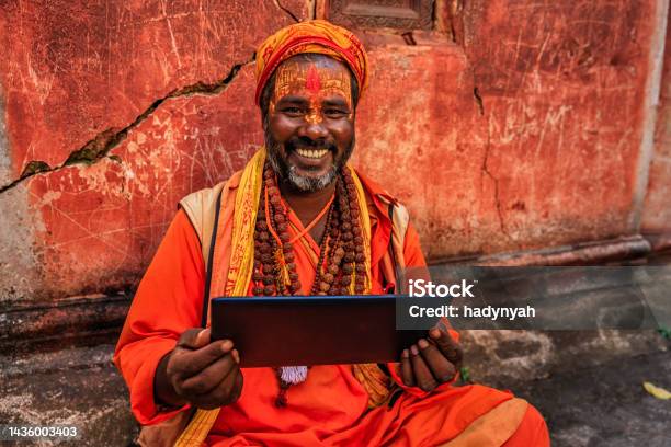 Sadhu Indian Holyman Using Digital Tablet Stock Photo - Download Image Now - Varanasi, Telephone, Pashupatinath