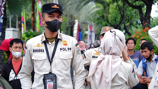 Jakarta, Indonesia - October 16,2022: Satpol PP or Polisi Pamong Praja is Indonesian civil service police