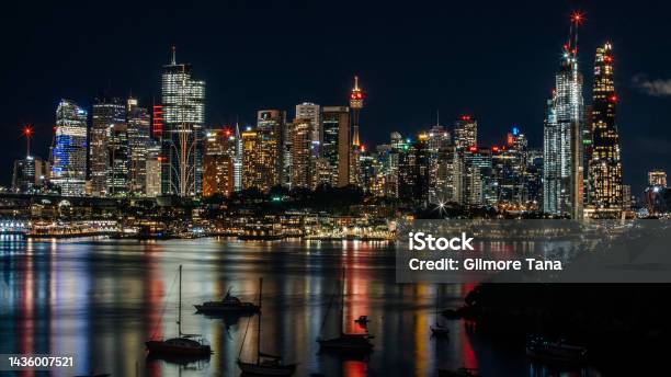 City Lights Silhouettes And Reflections Stock Photo - Download Image Now - Night, Urban Skyline, Architecture