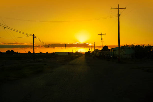 Back road with power lines in New Mexico - USA