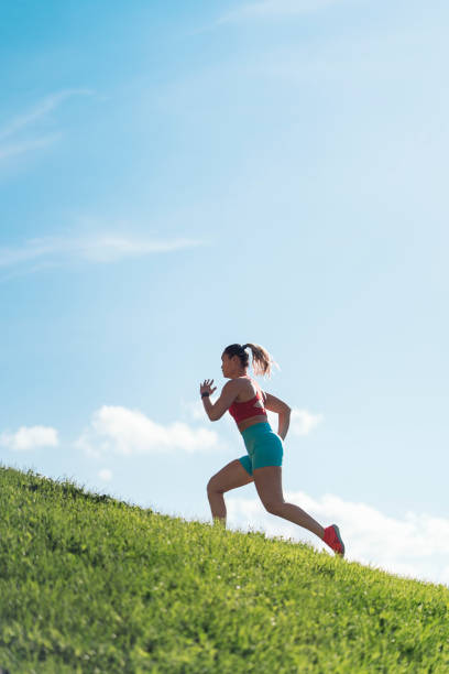 istock Runner Woman Training in the Park 1436025612
