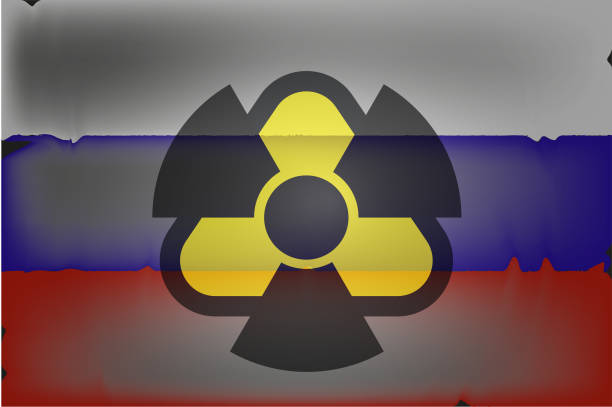 istock Nuclear danger sign on the background of the Russian flag. 1436026465