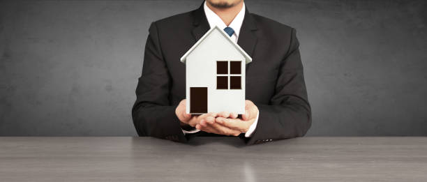 istock House Residential Structure in  hand 1436027278