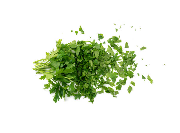 istock Chopped Parsley Leaves Isolated 1436028235