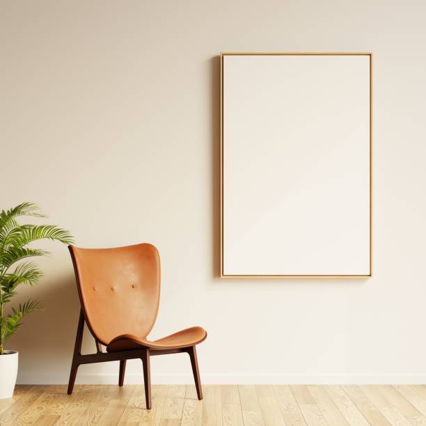 istock Large blank white noticeboard with wooden frame hanging on wall above comfortable chair. Template for your content. 3D illustration. 1436030903
