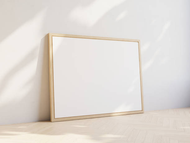 istock Empty white notice board leaning on white wall. Wooden frame and parquet flooring. Template for your content. 3D illustration. 1436030994