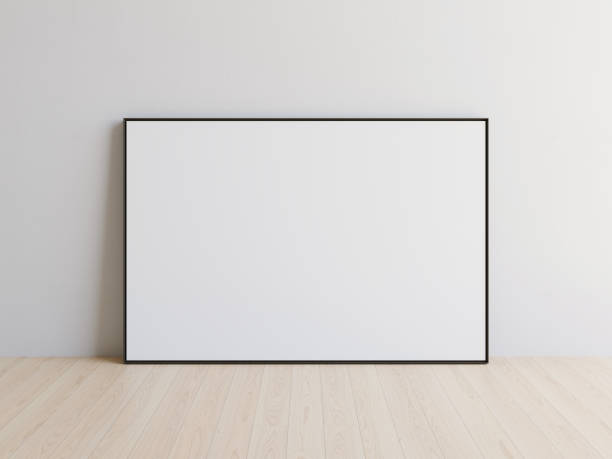 istock Thin black picture frame, blank landscape oriented picture at white wall. Template for your content. 3D illustration. 1436031000