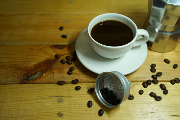 istock Hot black coffee in a white cup,coffee is a popular beverage all over the world. 1436031036