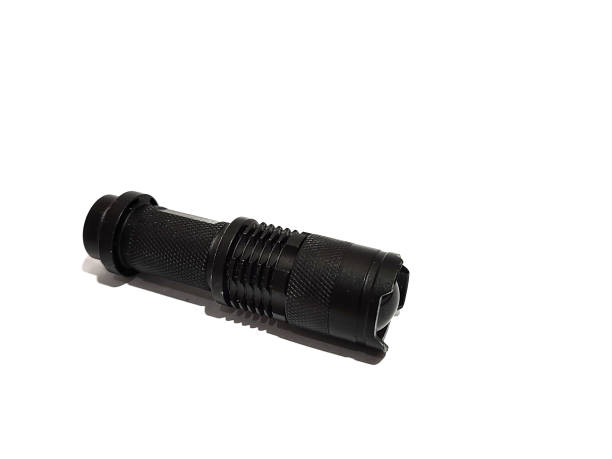 istock Small LED flashlight that usually used for camping, hiking, or any outdoor activities 1436032148