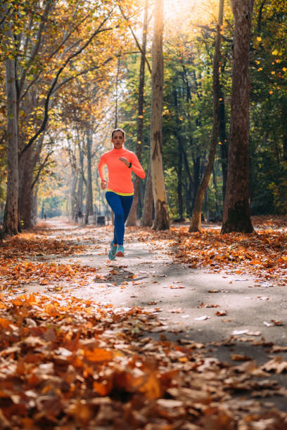istock Woman Jogging. Park, Nature 1436035223